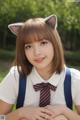 A young woman wearing a cat ears headband and a school uniform.